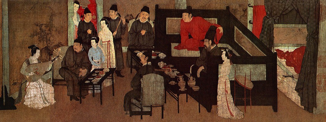 NIGHT BANQUET: a pipa player seated inside The Night Revels of Han Xizai.